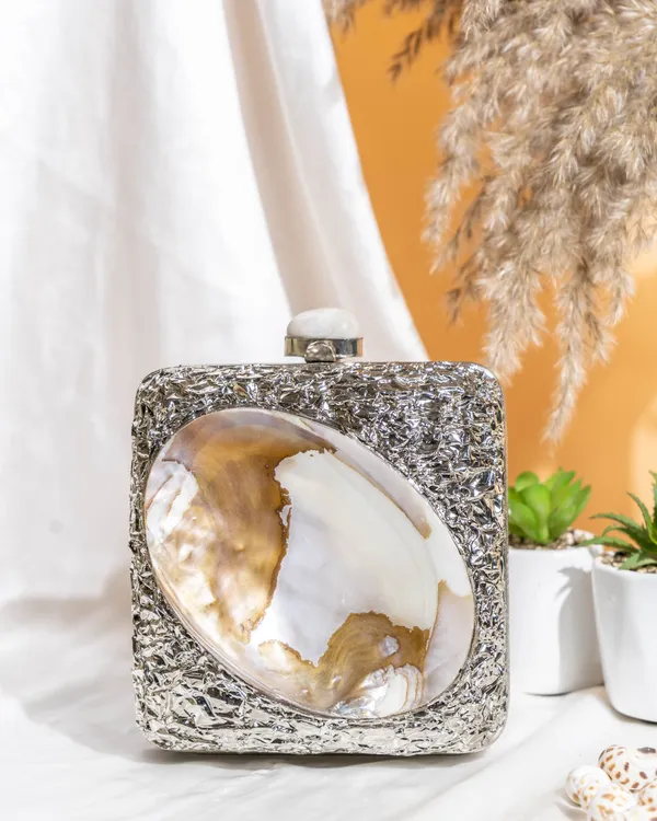 Kaia_Raw_Shell_Metal_Clutch